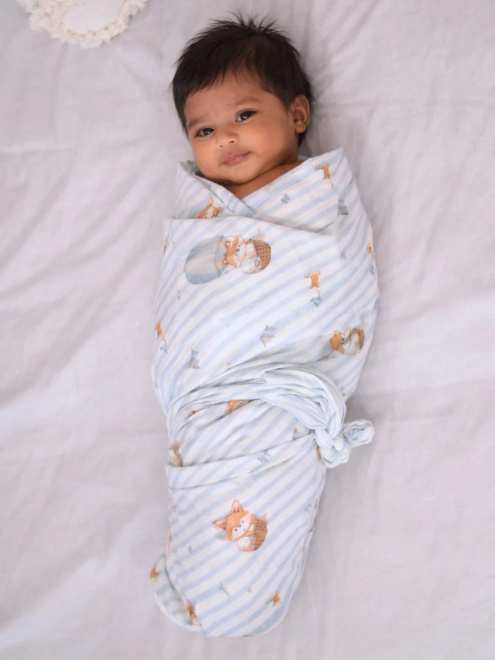 Pannolino gallery: Foxlet Tides | Bamboo Cotton Adjustable Baby Swaddle Wrap